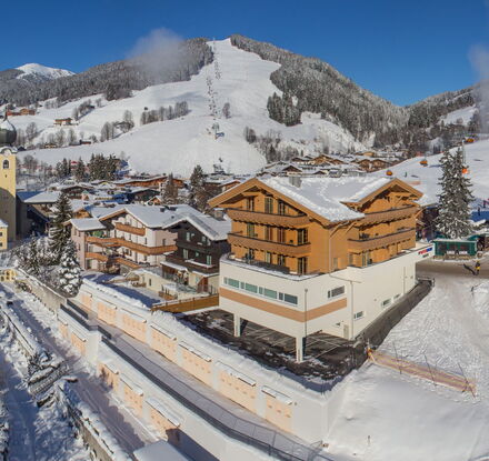 Exterior view of the Bolodges Apartments Saalbach winter Exterior view of the Bolodges Apartments Saalbach winter
